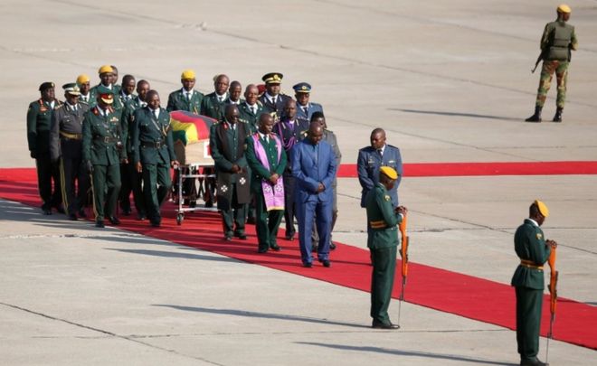 Mugabe's body arrives home