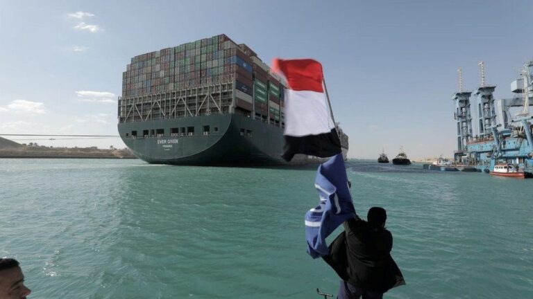 Suez Canal: Ships begin sailing through cleared waterway